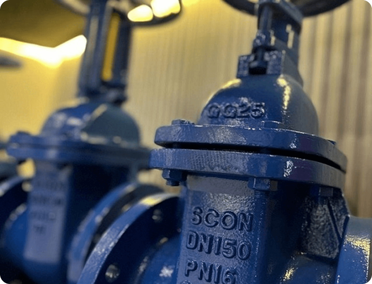 Blue industrial gate valves manufactured by SCONVALVES